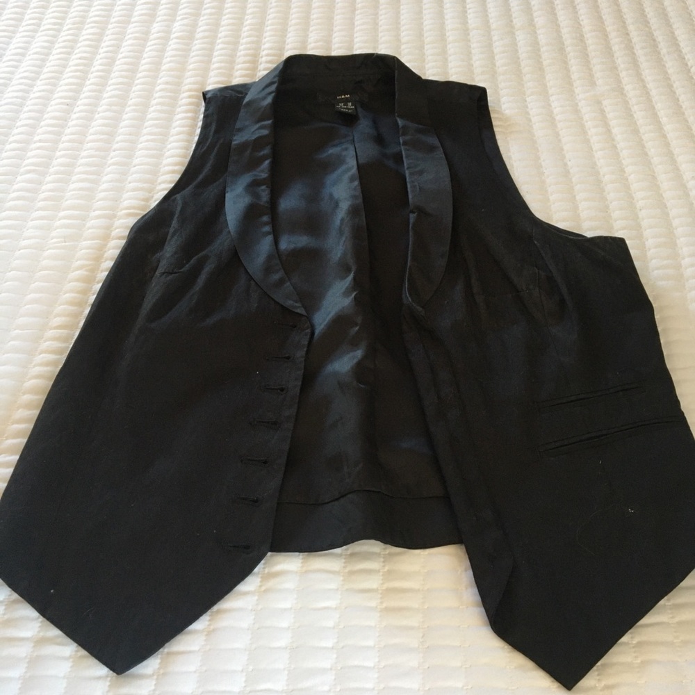 SOLD.   Vest